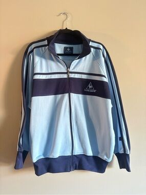 Vintage Le Coq Sportif Men's Light Blue and Navy Zip-Up Track Jacket